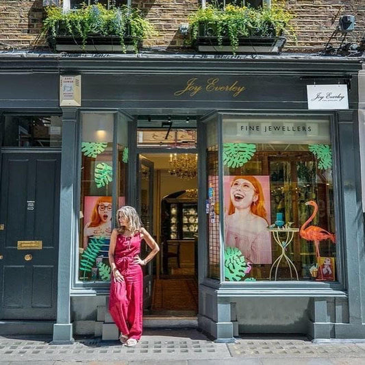 Joy Everley Stand in front of her store