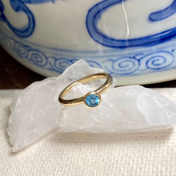 Solid Gold Blue Topaz Stacking Ring by Joy Everley