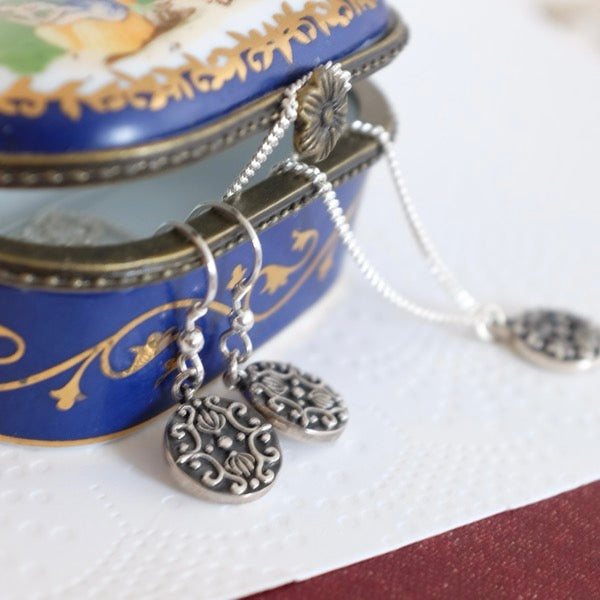 Silver Dark Baroque Disc by Joy Everley