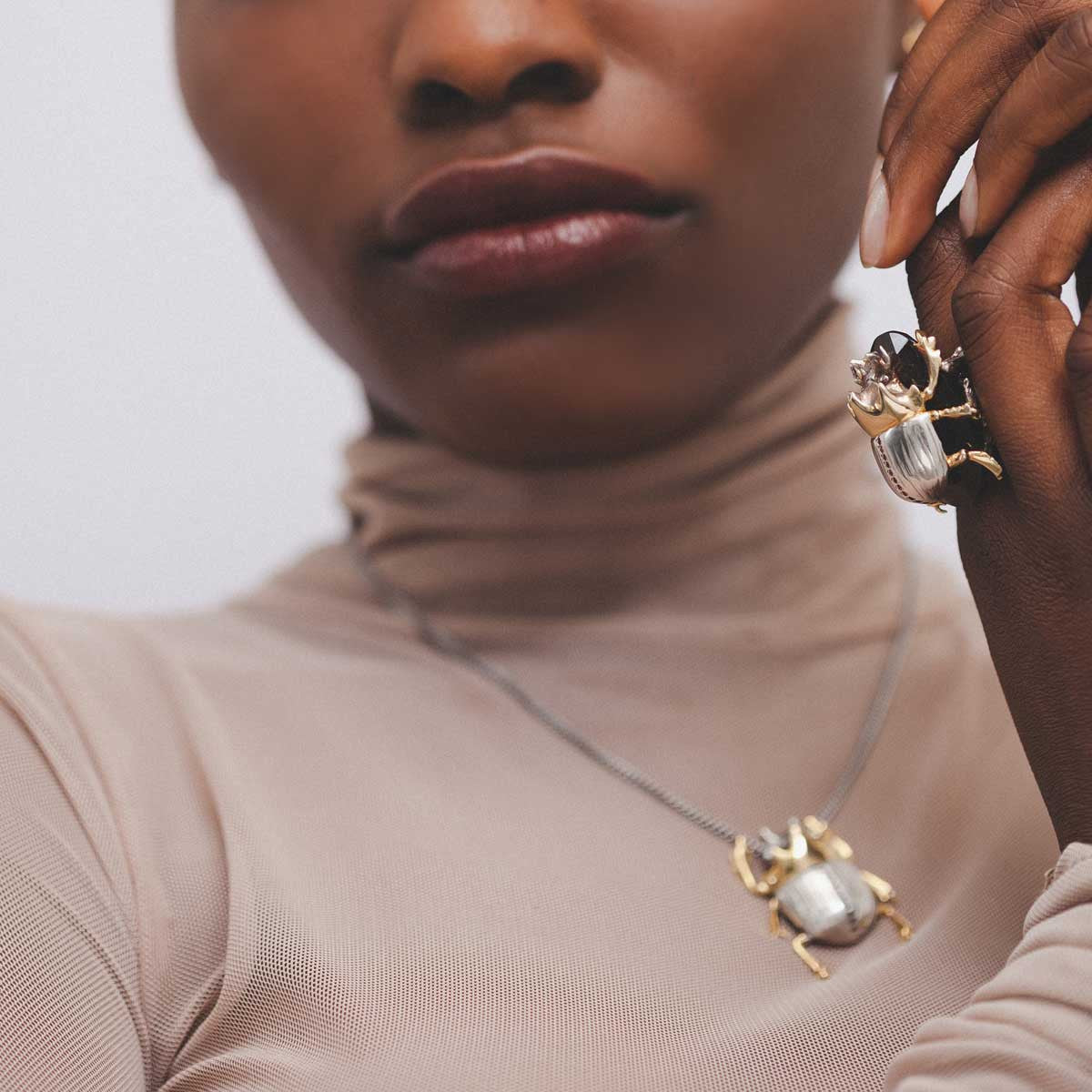 Gilded Scarab Cocktail Ring with garnet diamond smokey quartz