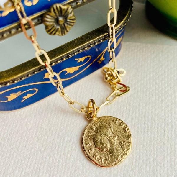 Solid Gold Coin by Joy Everley