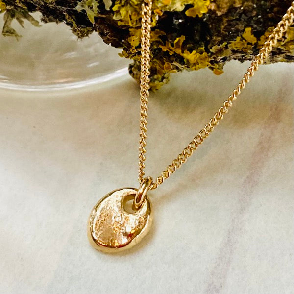 Solid Gold Tiny Rough Pebble Necklace by Joy Everley