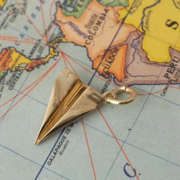 Solid Gold Paper Plane by Joy Everley