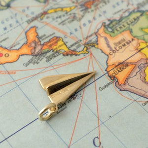 Solid Gold Paper Plane by Joy Everley
