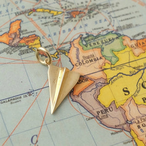 Solid Gold Paper Plane by Joy Everley