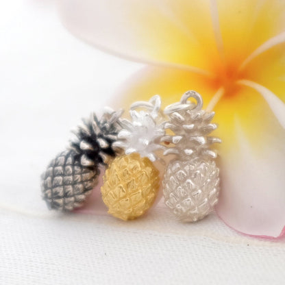 Trio of pineapple charms in dark silver, gold vermeil and silver