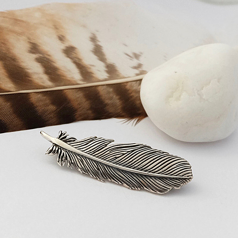 Silver and dark silver Buzzard Feather Brooch by Joy Everley